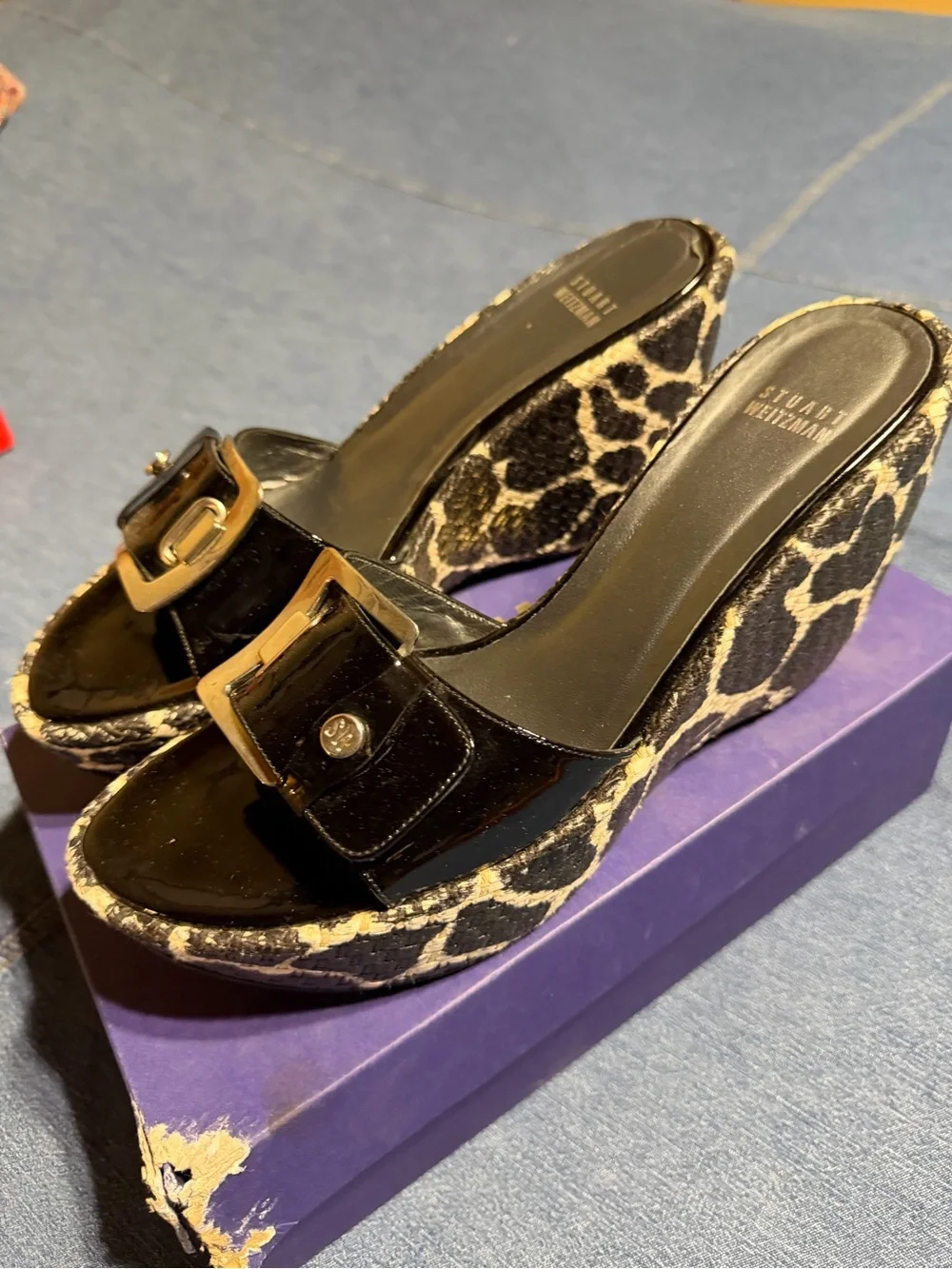 Stuart Weitzman Black Patent Buckle sandals.
